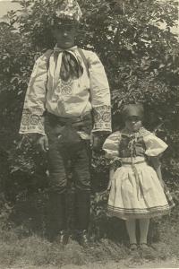 Father Josef Šalamun with Emilia dressed in Croatian folk costume