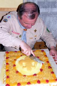 Cutting a cake - the scouts in Pražmo are celebrating their 20th anniversary