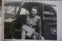 In her automobile after the war