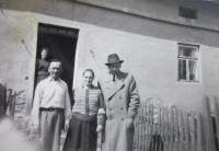 Parents Josef and Margita Válek, Marie Elšíková (Válková) standing in the door in Skorošice