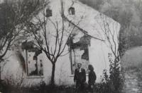house of the Vlček family after it was burned down