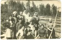 On the floating. Krasnoyarsk region, river Tuhach, Maryan-Klyn, 1948. Teklya Tykhan with a stick in hands