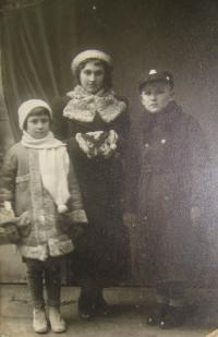 Josef Babák on the right side, Marie Lomská in the middle