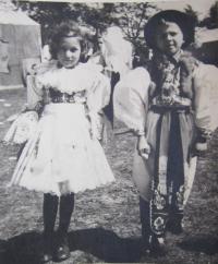 Anna Stančíková (Bachanová) with a friend at St Anthony’s in Blatnice dress
