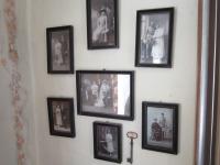 Family photographs on the wall