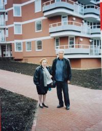 With her husband in front of their apartment in Prague - Jinonice