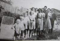 The complete Russnák family lined up according to age - photo was taken after they had been moved to Staré Město pod Sněžníkem