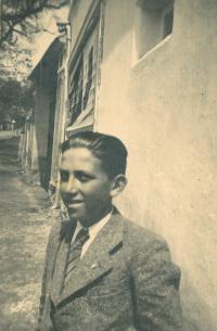 Witness Josef Jehlík in front of his native home, Úboč, 1937