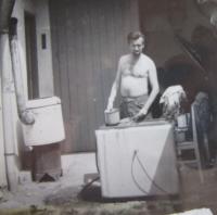 Doing the first laundry after the death of his mother
