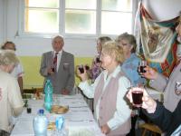 Members of Sokol congratulating Ludmila Chytilová on her 100th birthday