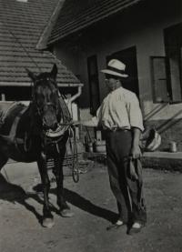 Vlasta's father in the yard with his mare, picture dates from before WWII