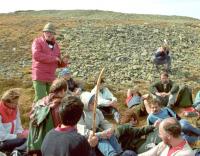 Professor Jan Jeník (standing) in Krkonoše mountains explains his theory of anemo-orographic systems to his students in 1996