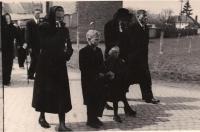 The family attending the funeral of their father in 1953