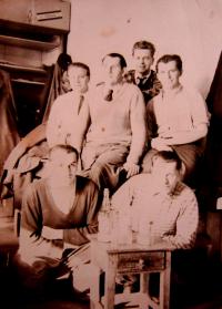 Adolf Kůrka in the upper row on the right in a tailor's shop in Opava