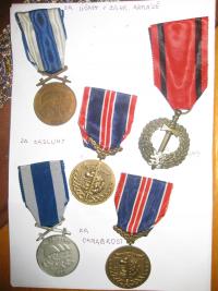 Medals awarded to her father Jiří Pujman