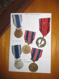 Medals awarded to her father Jiří Pujman
