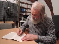 Jiří Kostúr is signing his book Satori v Praze