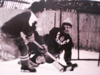 Mr. Tycar playing ice hockey
