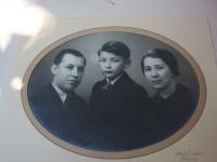 Karel Floss with his parents