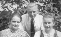 Inge with parents, at home in the garden, about 1939