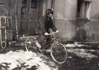 Young Chnápková Silvestra on a Bike