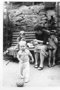 Wife Michaela with children in front of the house in Marxova street in Mladá Boleslav, where in this time the Jirounek s family lived.