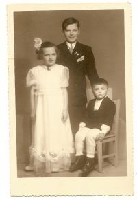 Břetislav with his brother and sister at a family wedding