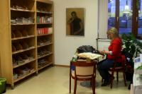 Exhibition opening in Hus library in Modřany, J.'s niece and his painting Gypsy woman, which he made as a student; Modřany, March 23, 2015