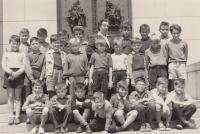 Year 1 at primary school, by the monument in Vítkov; Pavel Douša is in the second row, third from the right, 1954