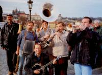 With the band he plays with on Charles Bridge in Prague; Pavel Douša is at the bottom, holding the banjo, 1990s