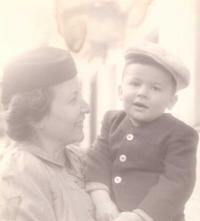 With his mother, 1940s