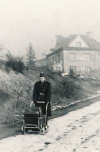 František Lobkowicz taking a walk with his newborn daughter Janička (in the carriage) during a short-term leave from his compulsory military service at PTP, between 1953 and 1954, historical photograph