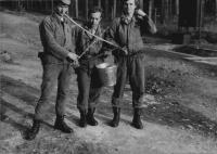 Two soldiers with "measures to civil" in the middle a rookie soldier, 1981