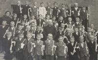Holy communion, Anton is in third row, fourth from right near teacher, 1942