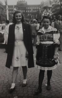 Jitka at the Wenceslas square in Prague, dressed in a folk costume sewed by her mother.