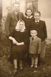 With parents in 1953