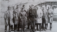 The members of the resistance group after his release from prison, J.C. standing behind the woman, 60s