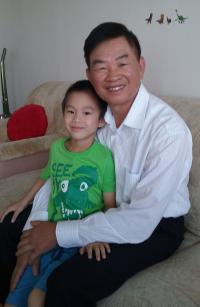 Te Do Hoang with grandson Honzík, 2016