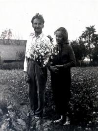 With her father during harvest time in her relatives' place, one year before the outbreak of WWII