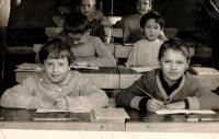 Jaroslav, the son of Blažena Nepauerová (on right) at a school desk in 1963