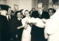 1946 - the christening of Jan Kucera, in arms of Jan Masaryk, mother (left), father (right behind Jan M.)