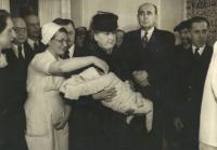 1946 - the christening of Jan Kucera, in arms of Hana Benesova, mother (left), father (right)