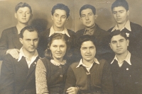 Antonín and Karla Moravec (botom left) and their Jewish foster children at Štiřín Hall