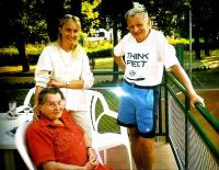 With daughter and mother playing tennis in 1990s
