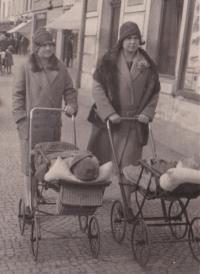Mother Jindřiška Moravcová (right) with little Václav Moravec, Čáslav main square, 1927