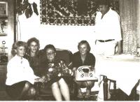 With her mother and siblings