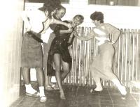 Celebrating birthday with her colleagues (in the middle)