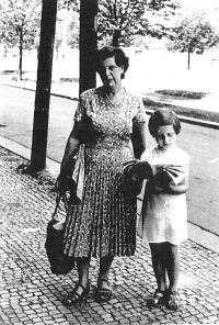 Eva nd her mother taking a walk and reading the Mateřídouška magazine, Prague about 1953