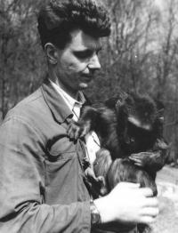 Josef Svoboda as animal nurse in Brno zoo with Tibetan macaque named Dare