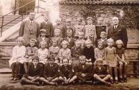 06 - Elementary School in Neveklov - second from the left in the front row, frowning